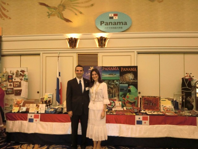 H.E. Jorge Kosmas Sifaki, Ambassador of Panama to Japan and his wife, Ileana de la Guardia de Kosmas, in front of the booth of the Embassy of Panama